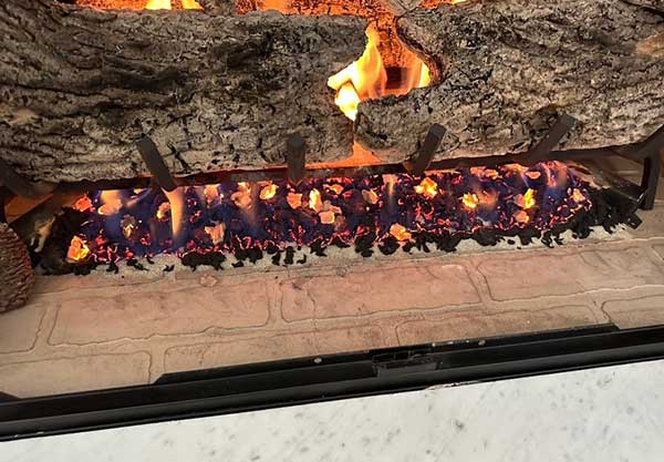 Gas log spruce up before